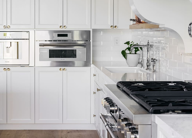 Refinished white kitchen cabinets
